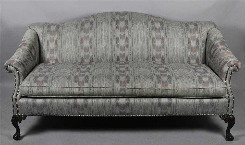 Appraisal: GEORGE III STYLE MAHOGANY CAMELBACK SETTEE of typical form with