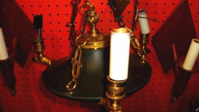 Appraisal: Empire Style Brass and Black Metal Chandelier together with a