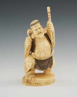 Appraisal: A Carved Ivory of a Fisherman Carved figure of a