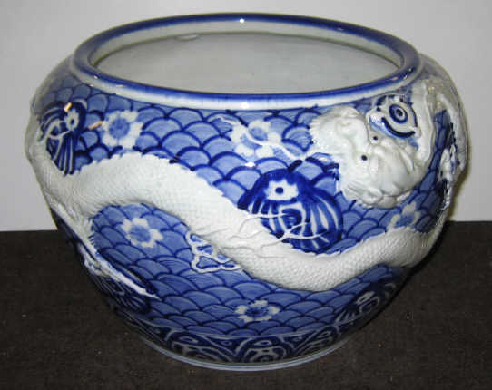 Appraisal: FINE CHINESE BLUE WHITE JARDINIERE Decorated in relief with a