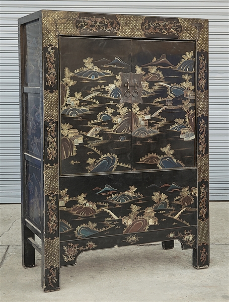 Appraisal: Chinese painted wood two door cabinet with landscape motifs one