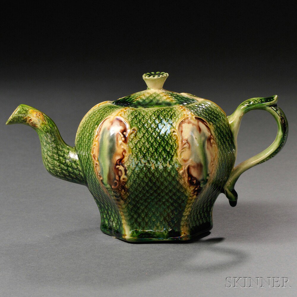 Appraisal: Staffordshire Cream-colored Earthenware Teapot and Cover England c green glazed