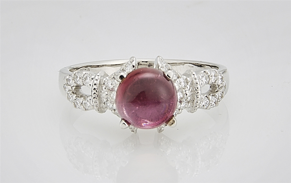 Appraisal: k white gold pink tourmaline and diamond ring tourmaline cabochon