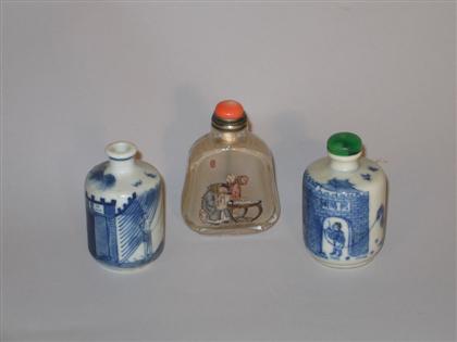 Appraisal: Three snuff bottles two blue and white porcelain the other