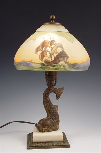 Appraisal: PAIRPOINT REVERSE PAINTED BOUDOIR DESK LAMP WITH FIGURAL BASE Tall