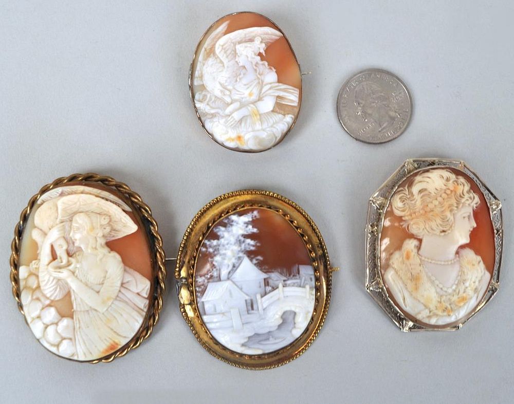 Appraisal: Group Four Cameos Two Gold comprising two women with eagles