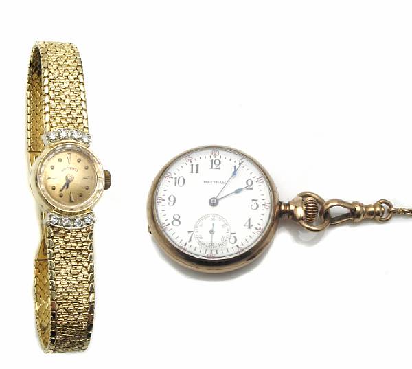 Appraisal: A gold and diamond Hamilton wristwatch with a gold Waltham