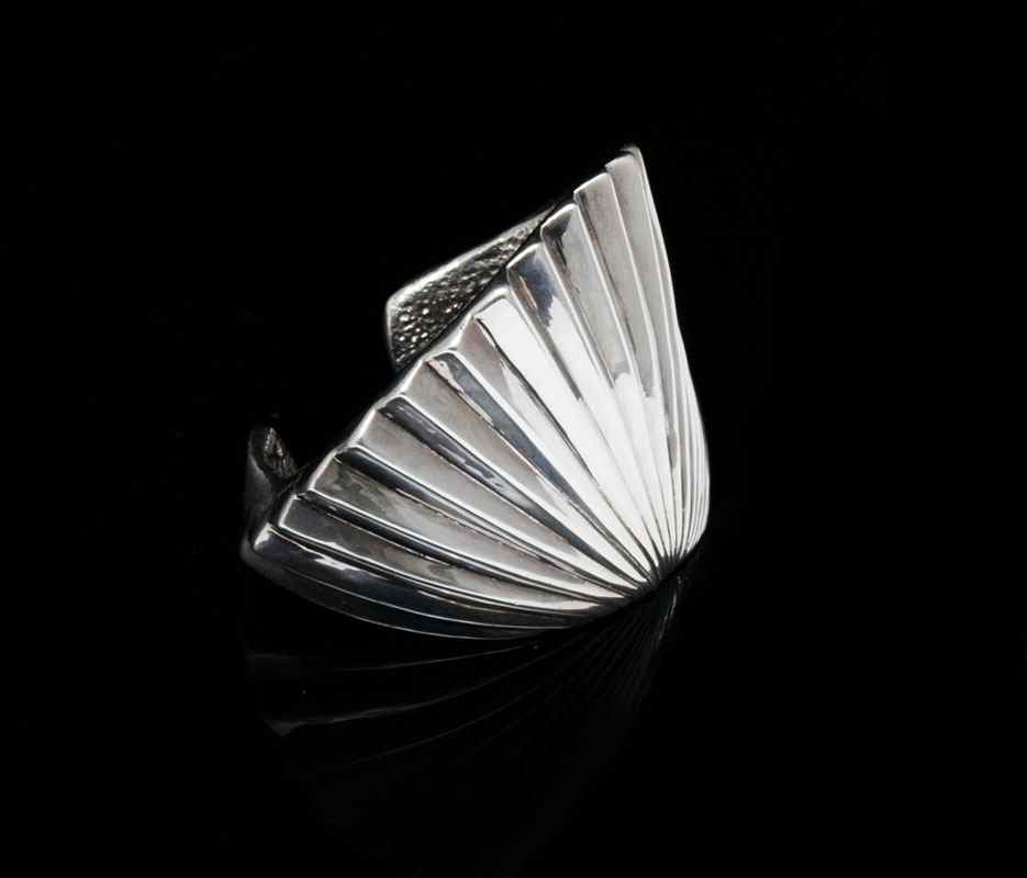 Appraisal: YAACOV HELLER SCULPTURAL STERLING CUFF BRACELET Bold ribbed design Heller