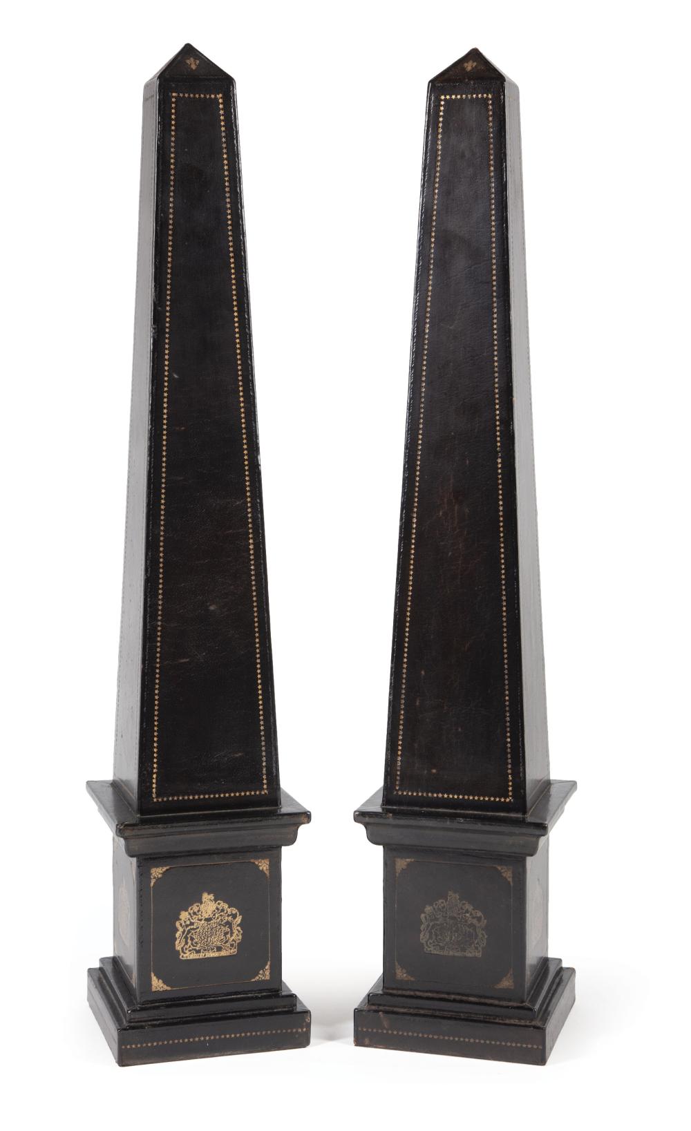 Appraisal: Pair of Continental Faux Tooled Leather Obelisks th c h