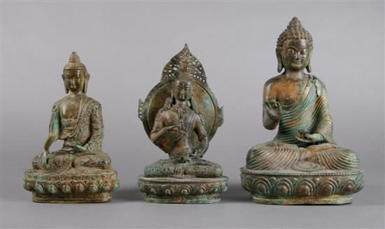 Appraisal: A Set of Three Asian Bronze Buddhas Height of tallest