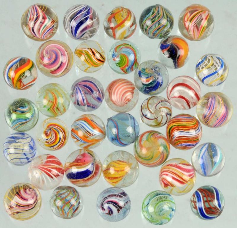 Appraisal: Lot of Hand-Made Marbles Condition Near Mint Plus Size Largest