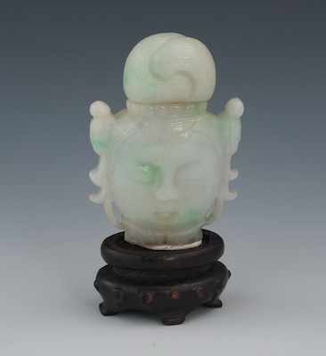 Appraisal: A Chinese Jadeite Quan Yin Head Snuff Bottle Carved front