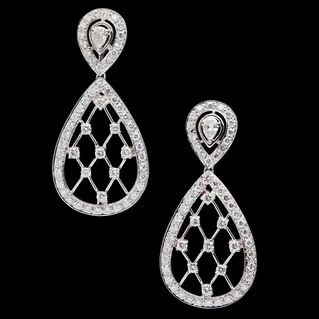 Appraisal: A pair of diamond set pendant earringseach claw set with