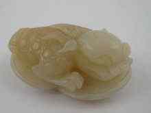 Appraisal: A Chinese jade pendant well carved as a warty toad