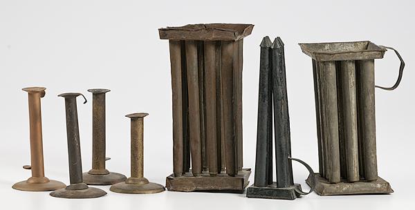 Appraisal: HOGSCRAPER CANDLESTICKS PLUS CANDLE MOLDS American th century total includes