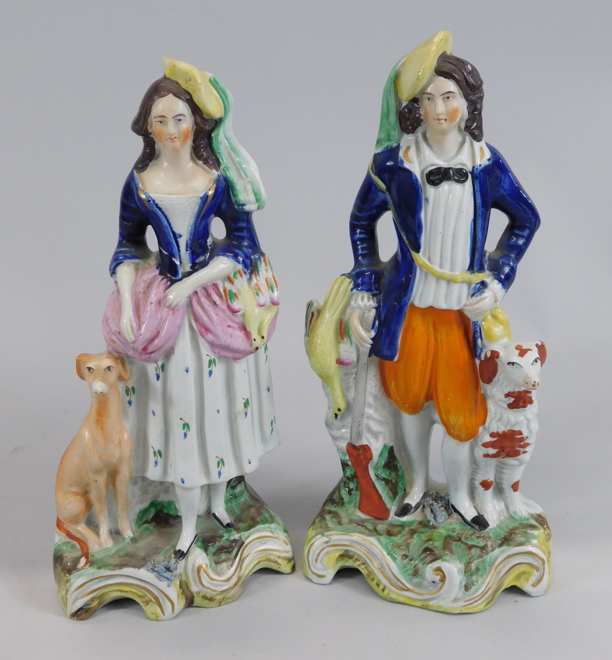 Appraisal: A pair of mid thC Staffordshire figures each modelled in