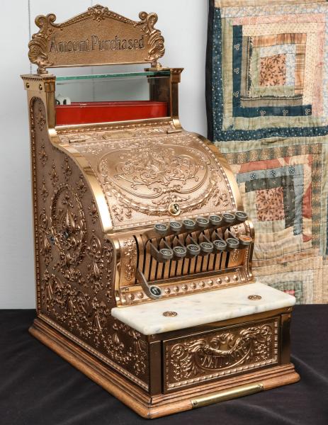 Appraisal: A NATIONAL CASH REGISTER MODEL WITH TOP SIGNThe fleur de