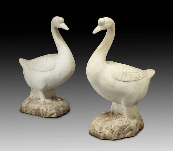 Appraisal: A pair of carved marble models of geese Each standing