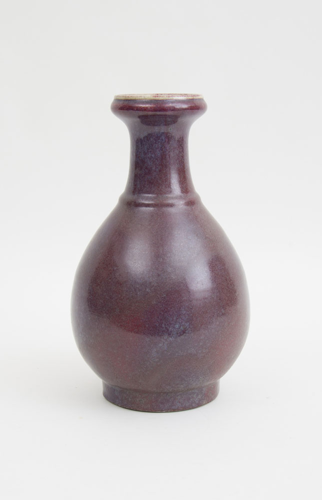 Appraisal: CHINESE FLAMB -GLAZED PORCELAIN BOTTLE VASE With a circular ringed