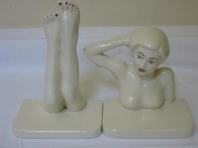 Appraisal: A PAIR OF CARLTON WARE WHITE GLAZED EARTHENWARE NOVELTY BOOKENDS