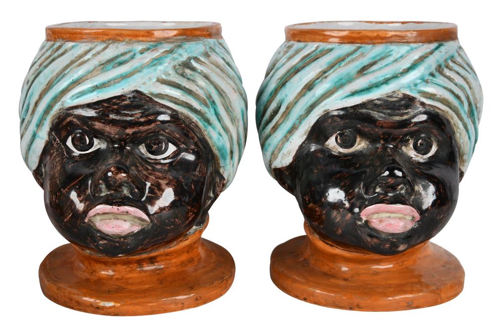 Appraisal: PAIR OF CONTINENTAL GLAZED TERRACOTTA BLACKAMOOR CACHEPOTSunmarked Provenance The Estate