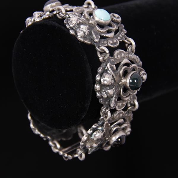 Appraisal: Italian Renaissance Revival layered Florentine silver Cherub Bracelet with semi