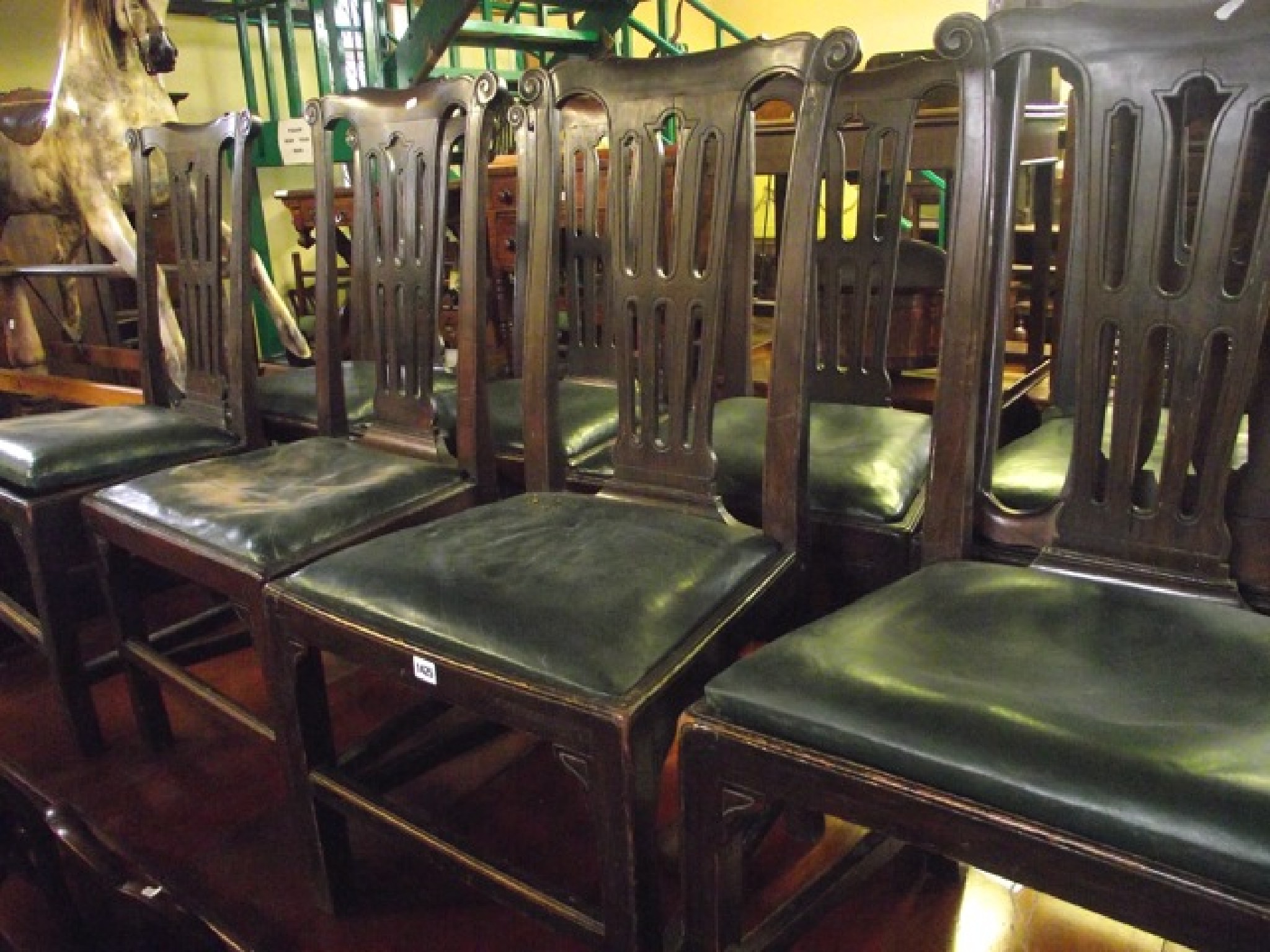 Appraisal: A set of ten th century dining chairs with carved