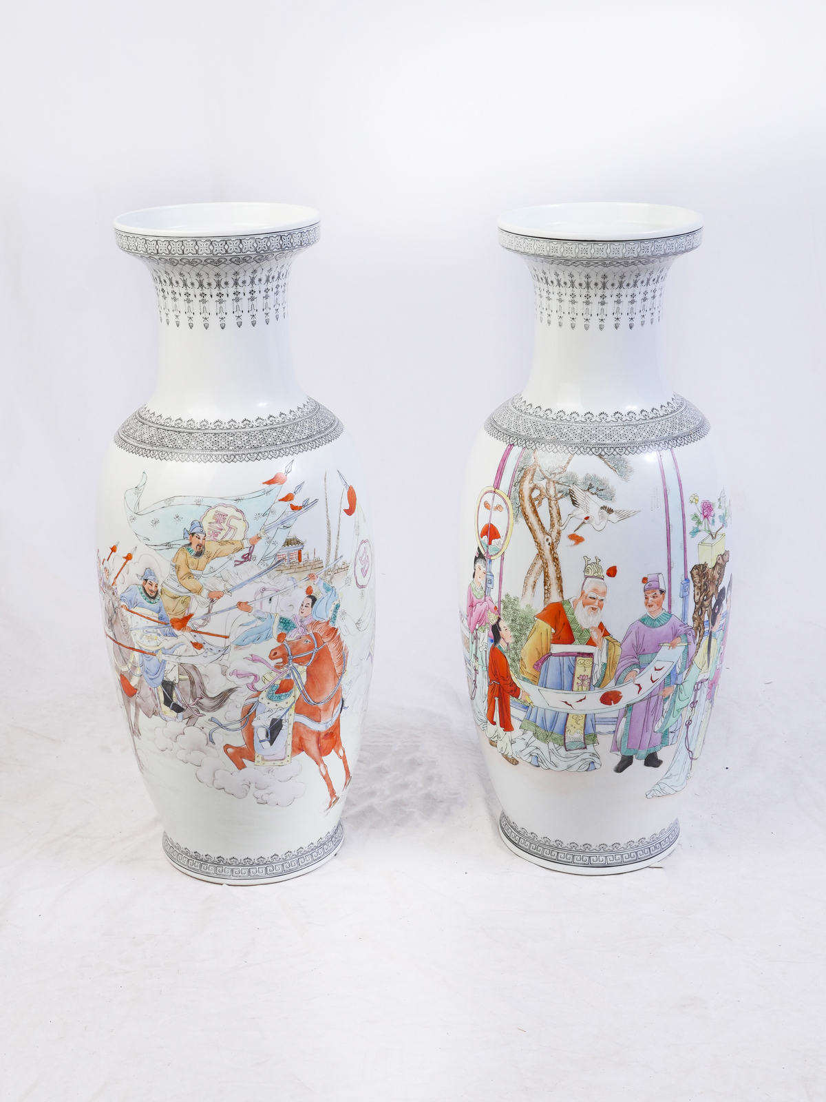 Appraisal: TWO CHINESE PORCELAIN FIGURAL VASES Pair of figural Chinese Famille