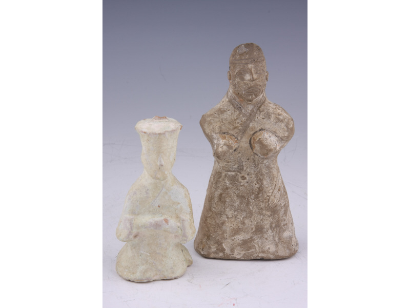 Appraisal: Two Chinese Han Dynasty Figurines the first a shaman Western