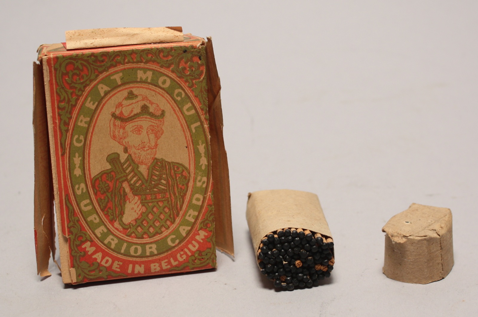 Appraisal: CASED DECK OF PLAYING CARDS AND CASED BOX OF MATCHES