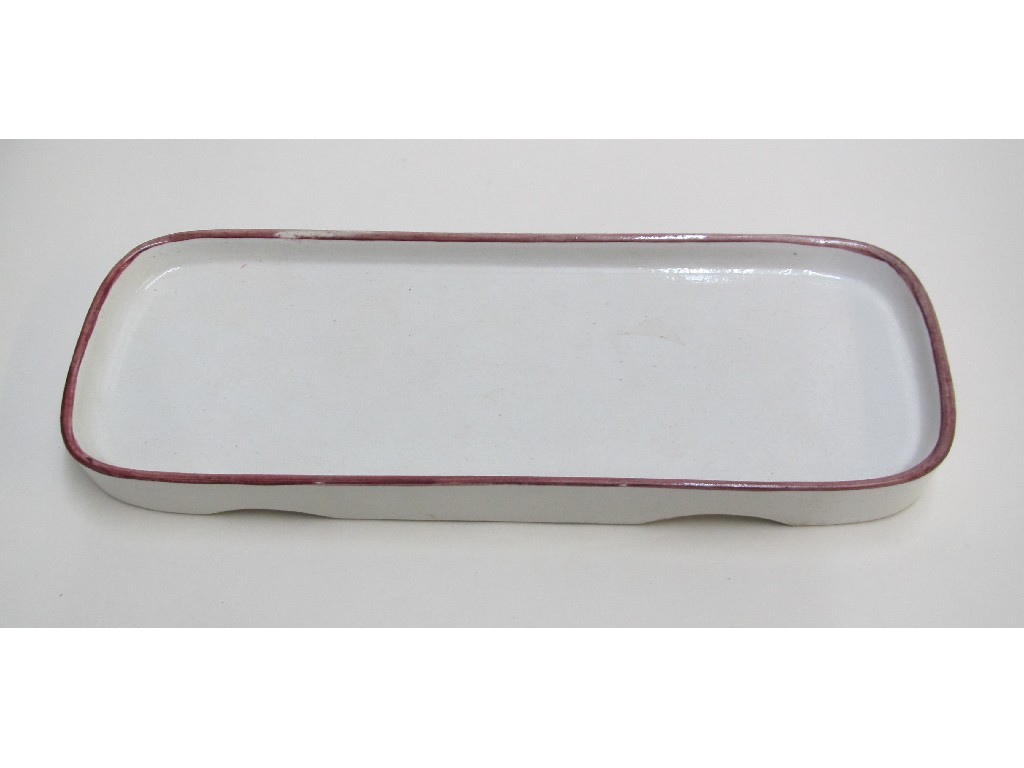 Appraisal: A Wemyss rectangular pen tray with pink rim impressed blue