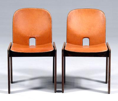 Appraisal: Pair Cassina chairs teakwood with original leather seats and backs