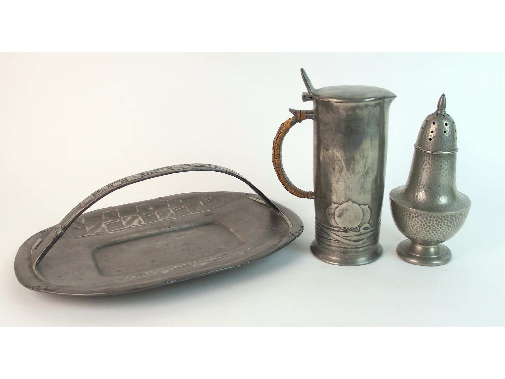 Appraisal: Archibald Knox for Liberty pewter tankarddecorated with stylised honesty and