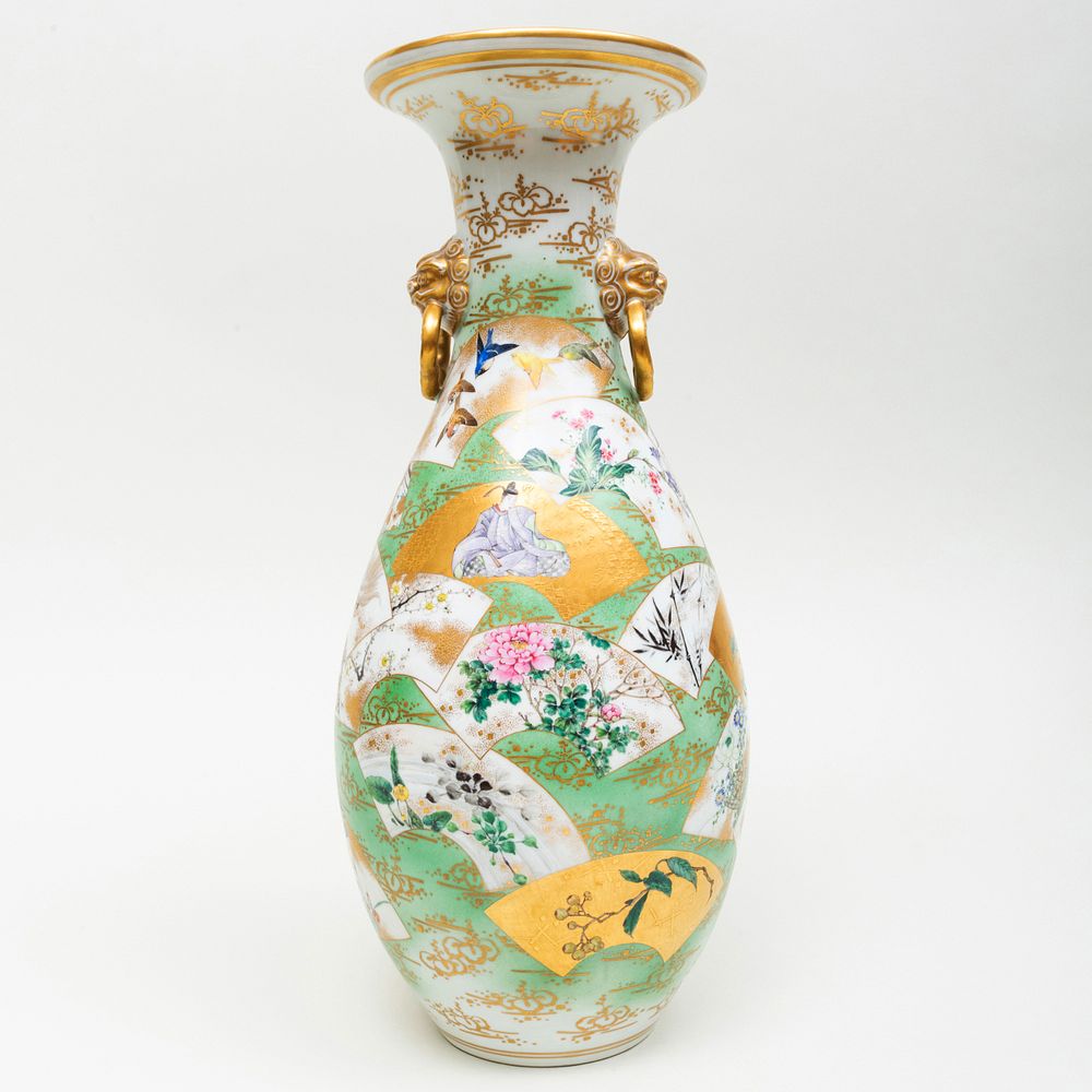 Appraisal: Japanese Porcelain Vase with Fan Decoration Blue character mark to