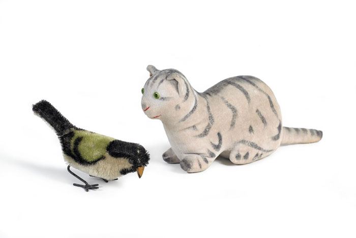 Appraisal: TWO TOYS STUFFED CROUCHING TIGER KITTEN AND MECHANICAL PLUSH VELVET