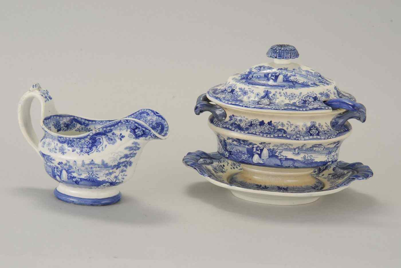 Appraisal: TWO STAFFORDSHIRE PIECES th CenturyA sauceboat and a covered sauce