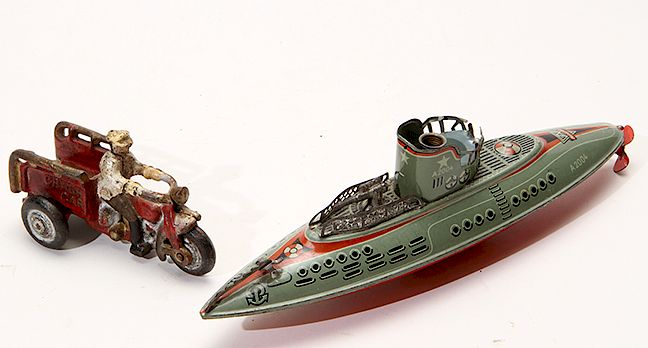 Appraisal: Antique Toys Exclusive on Bidsquare A tin submarine made by