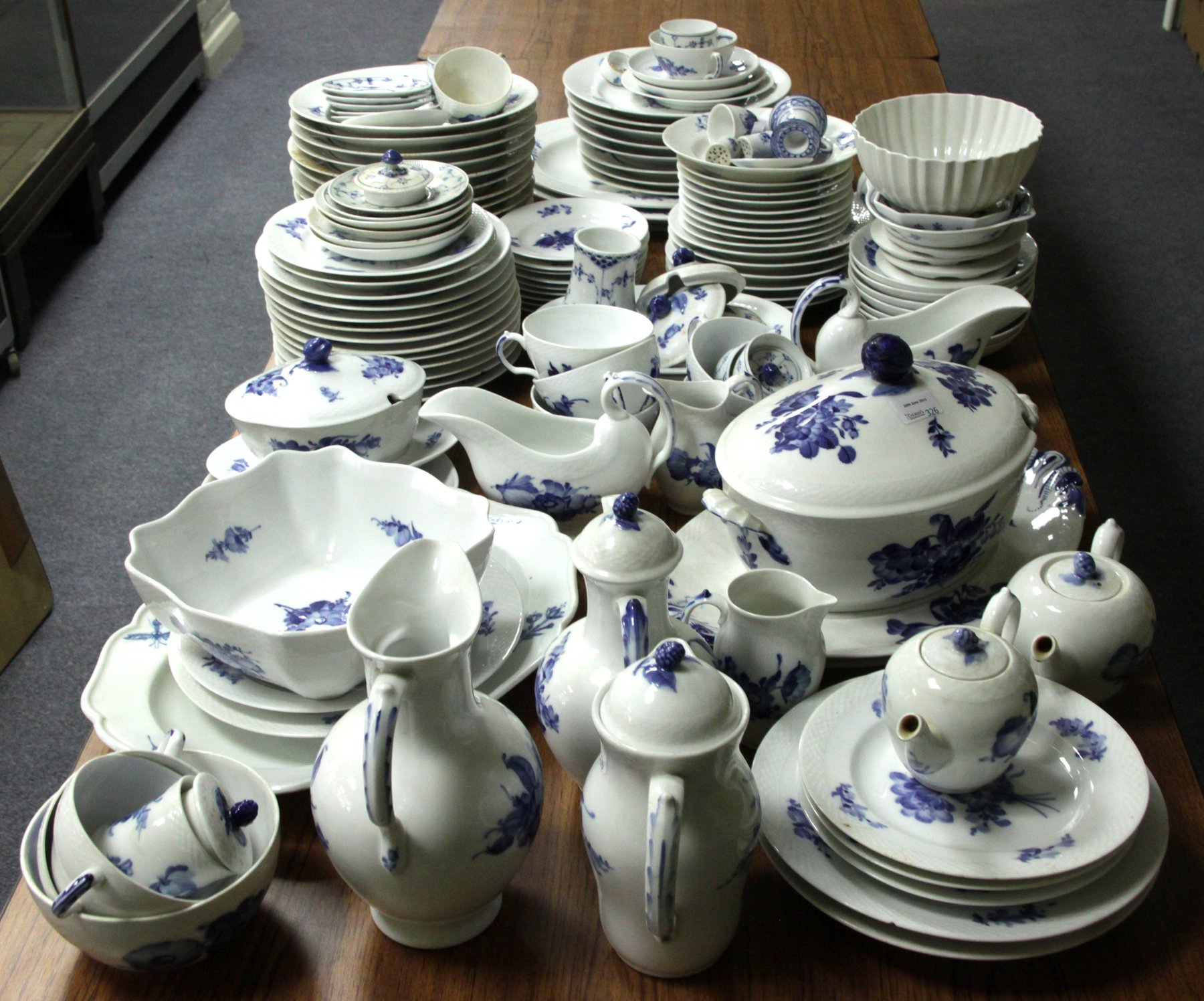 Appraisal: A Royal Copenhagen dinner and tea service painted with blue