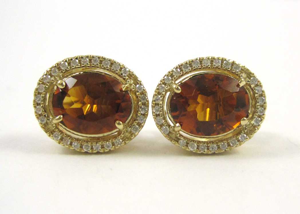 Appraisal: PAIR OF CITRINE AND DIAMOND STUD EARRINGS each k yellow