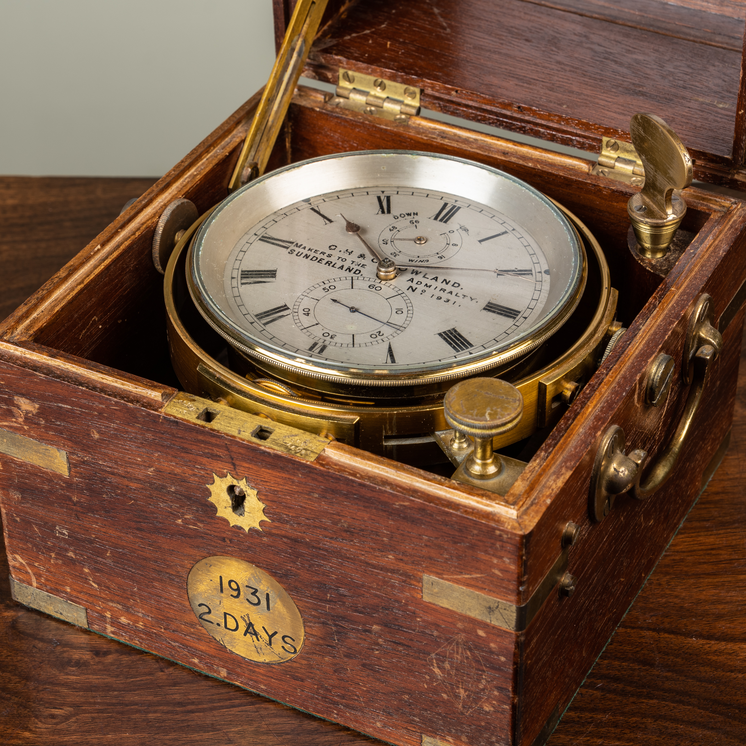 Appraisal: A two-day marine chronometer by Gowland in a brass-bound mahogany