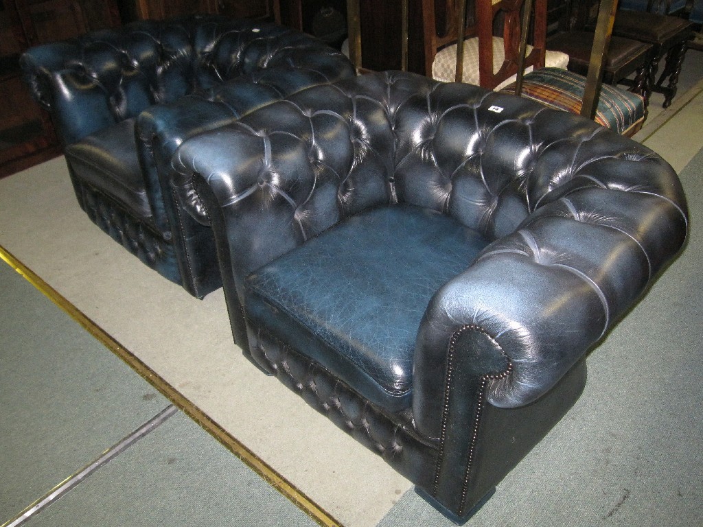 Appraisal: Pair of leather upholstered buttonback armchairs