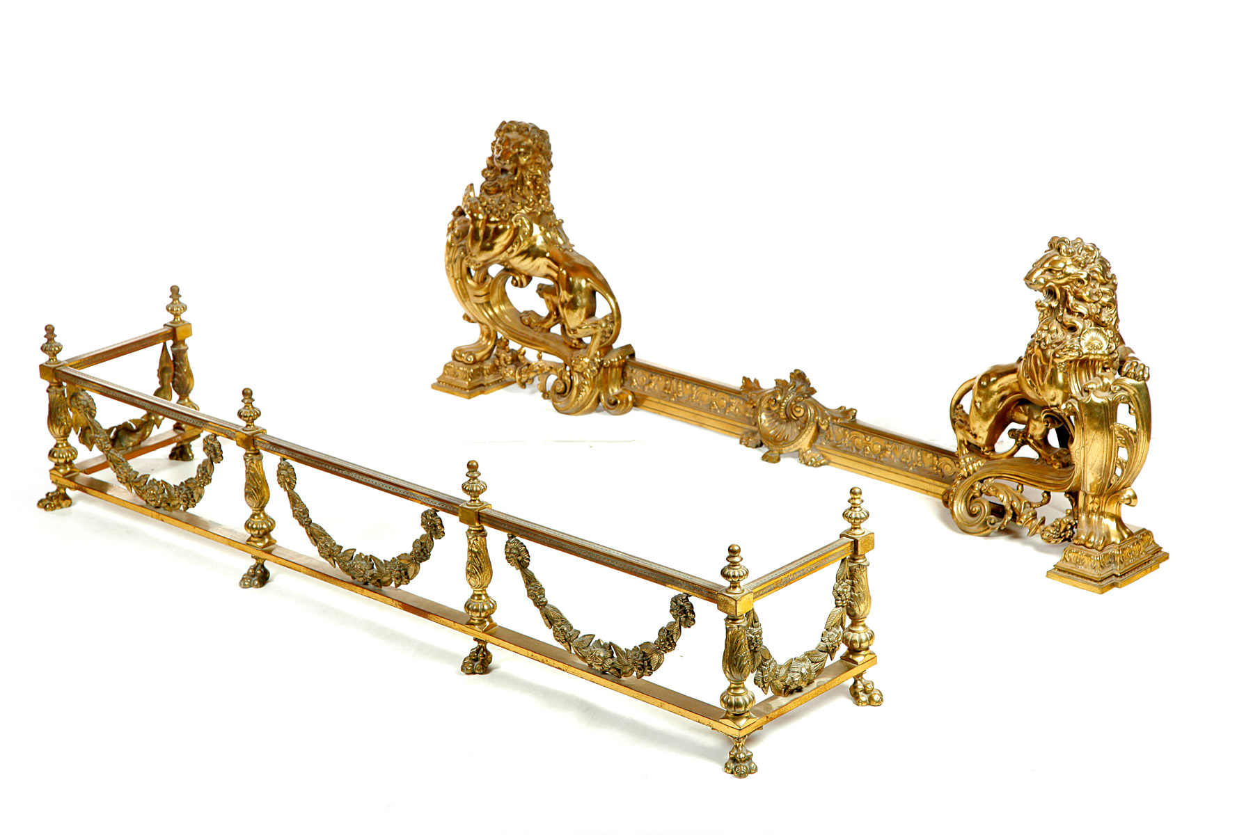 Appraisal: TWO ROCOCO-STYLE BRASS FIREPLACE FENDERS American or European th century