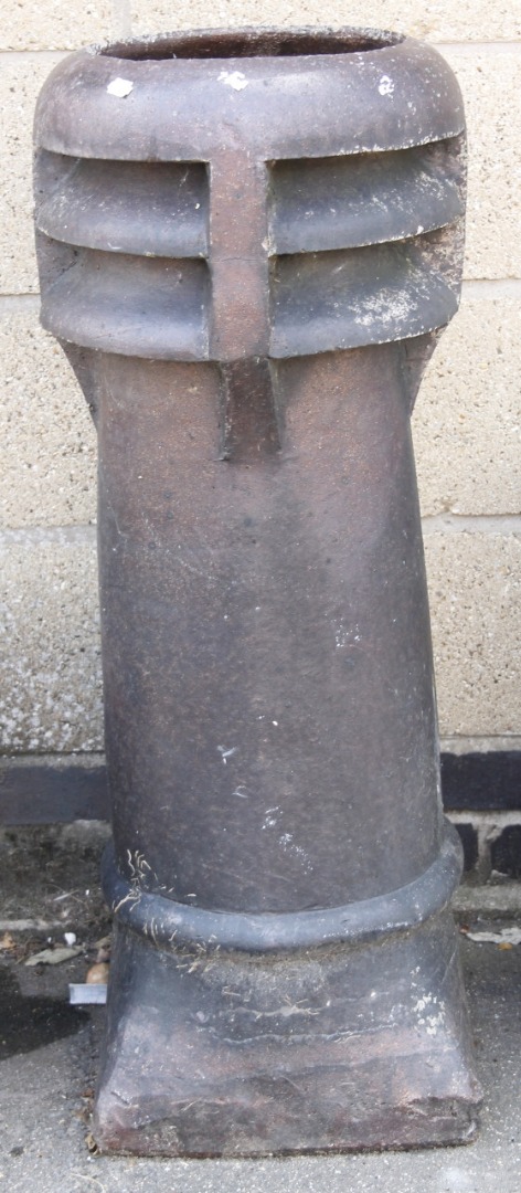 Appraisal: An early thC stone baked chimney with cylindrical pierced outline