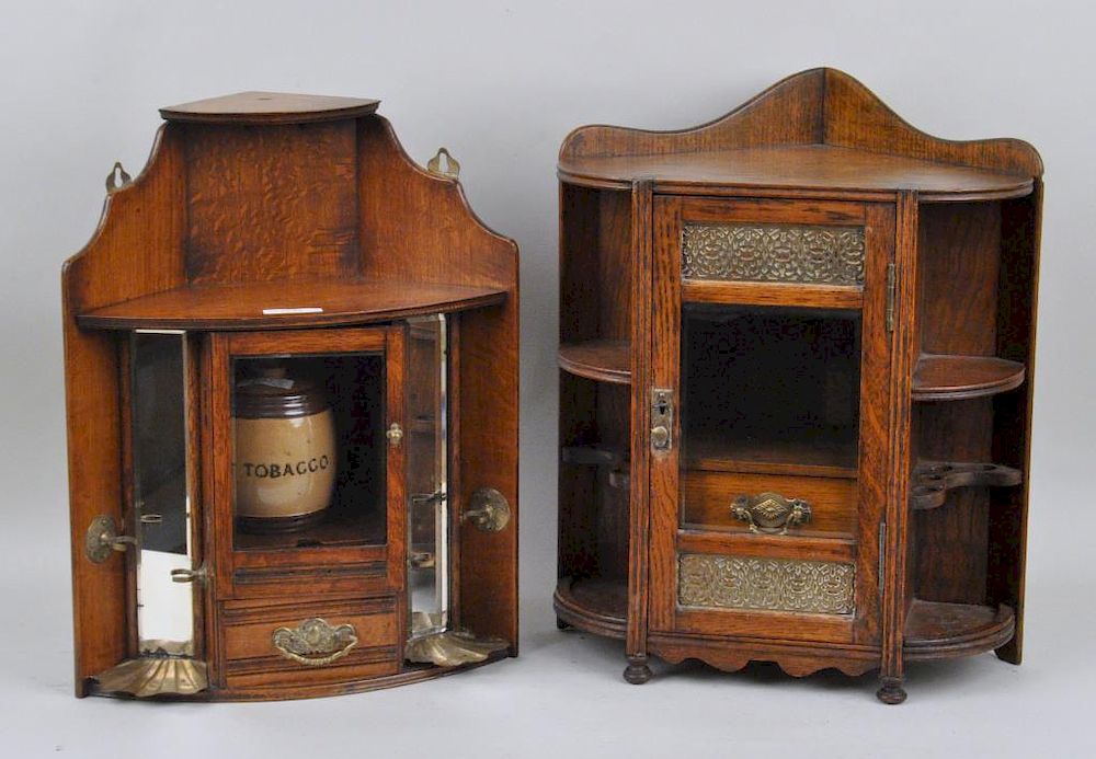 Appraisal: Two English Oak Tobacco Corner Cabinets with brass mounts bevelled