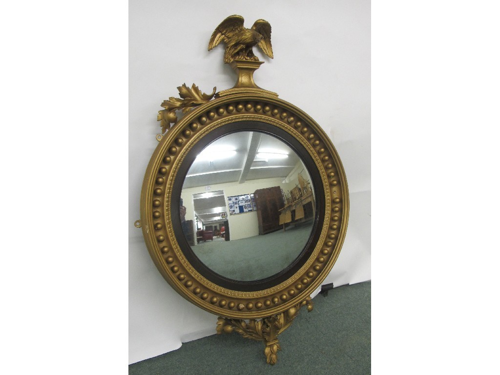 Appraisal: A th Century gilt wood convex wall mirror the circular