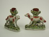 Appraisal: SPILL VASES - Pair of th C Staffordshire figural spill