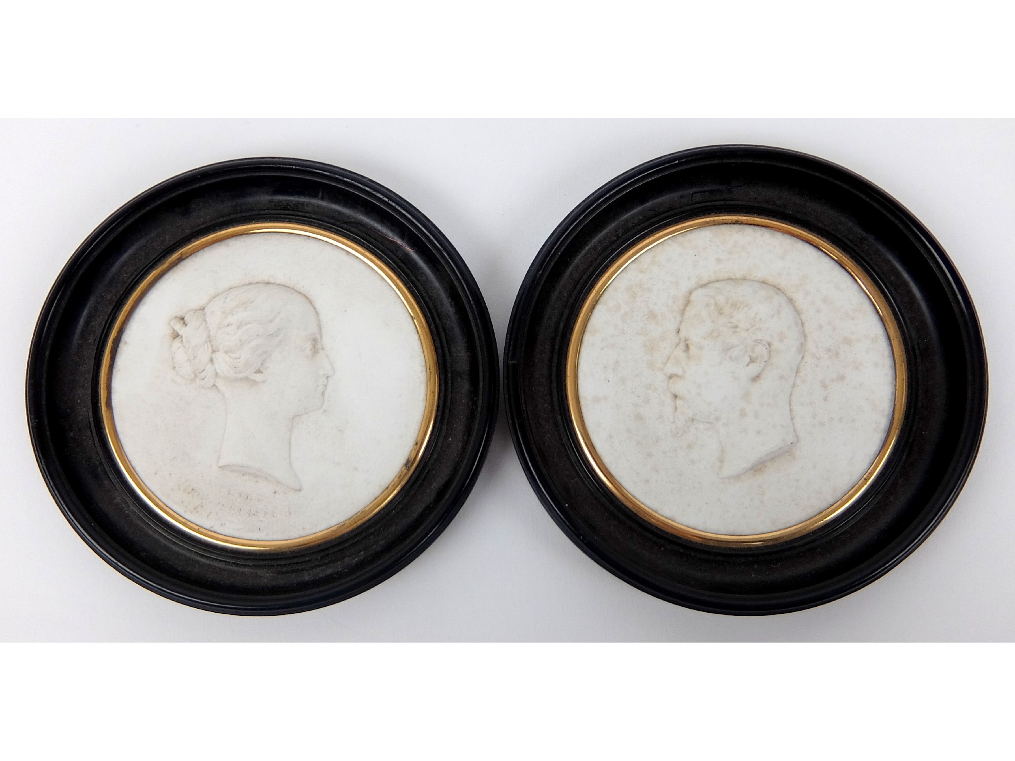 Appraisal: A Sevres biscuit porcelain profile portrait of EugenieEmpress of France