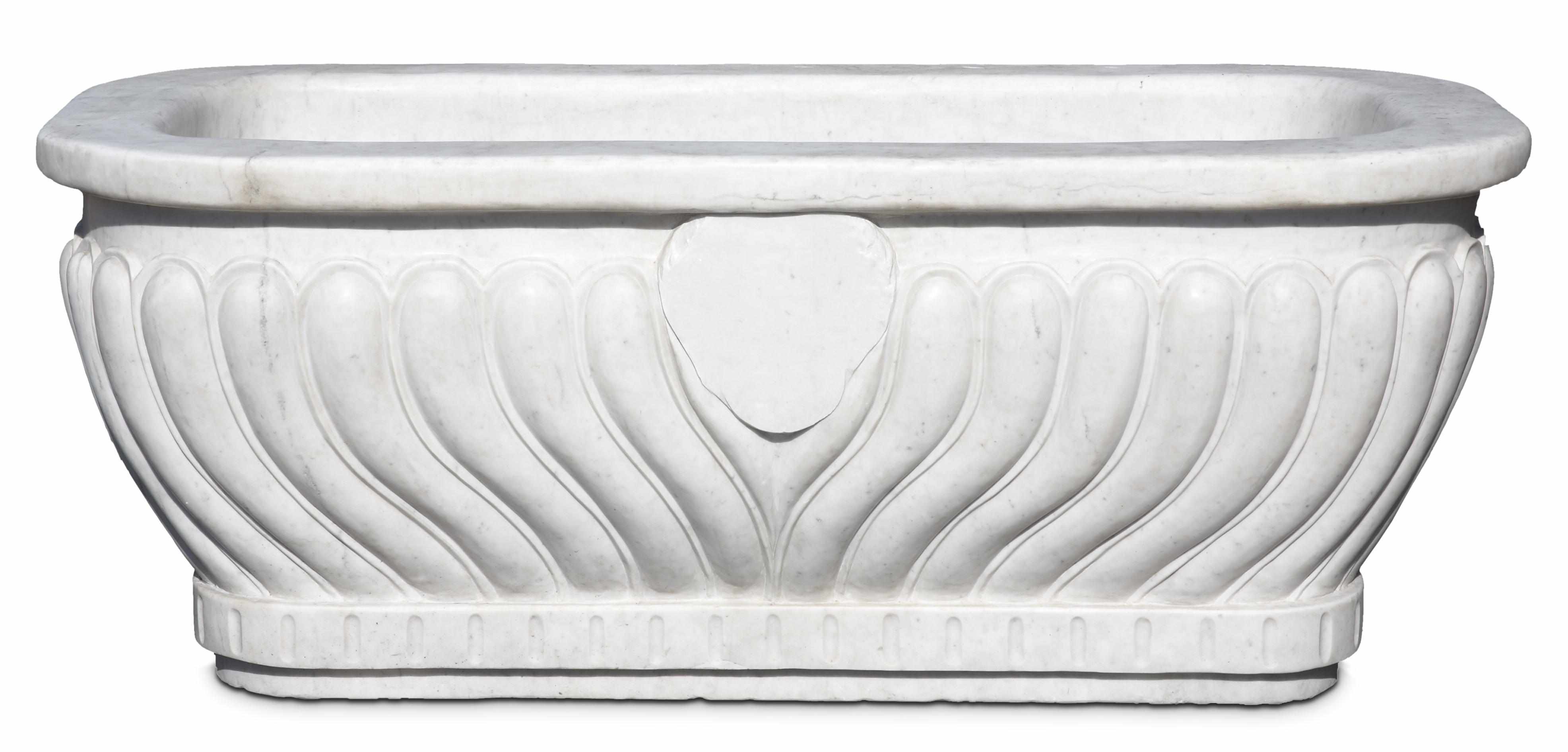 Appraisal: A Neoclassical style carved marble bath With wrythen ornament on