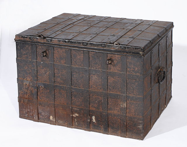 Appraisal: A TH CENTURY IRON RECTANGULAR TRUNK with banded top front