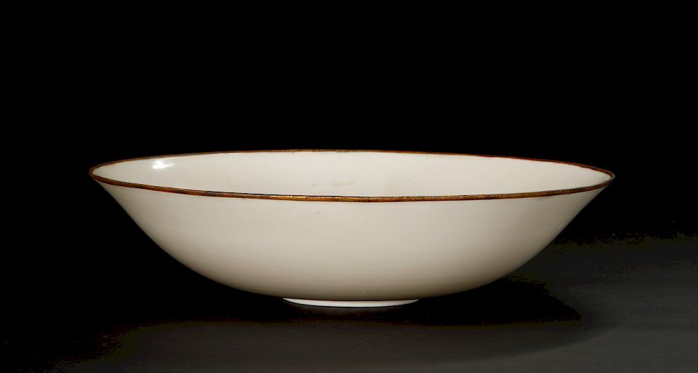 Appraisal: Large Carved Ding Ware Bowl Finely potted with wide flaring